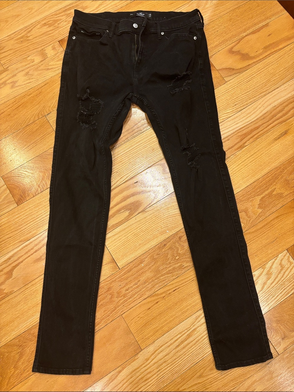 Hollister Men’s Black Stacked Skinny Jeans with distressed detail